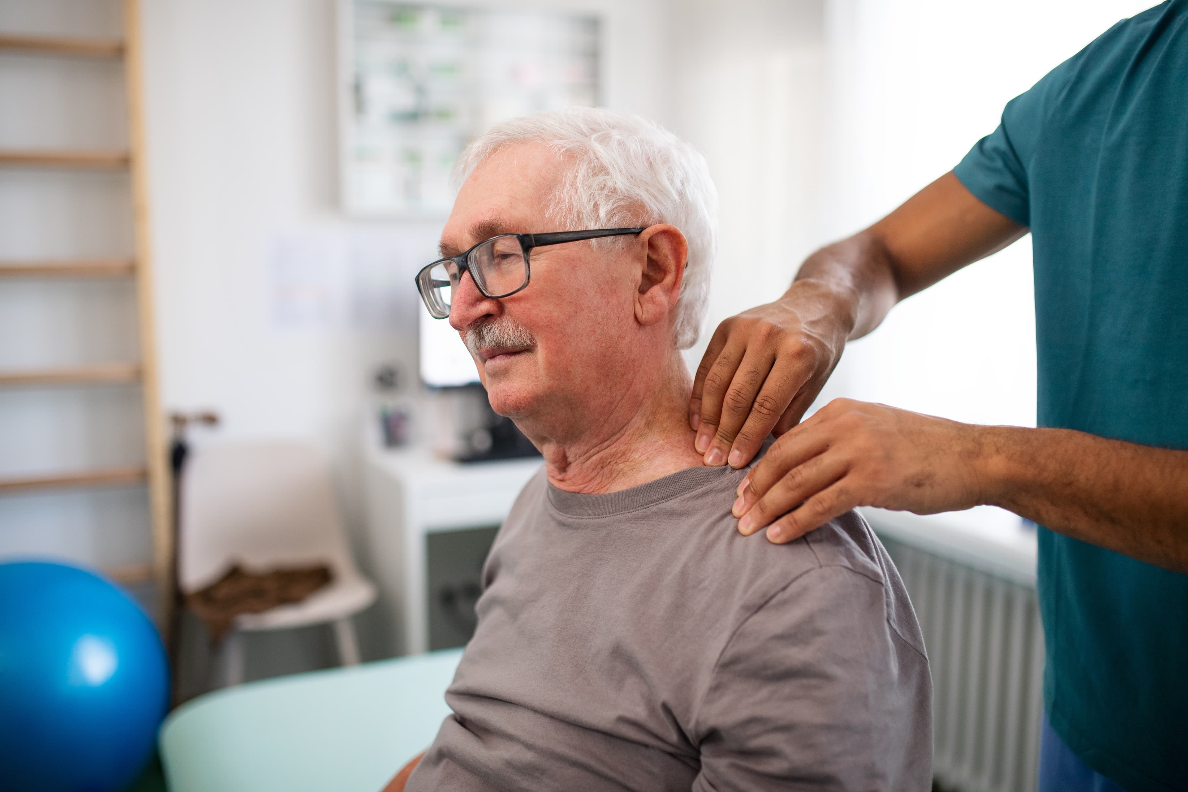 Elderly client enjoying massage session